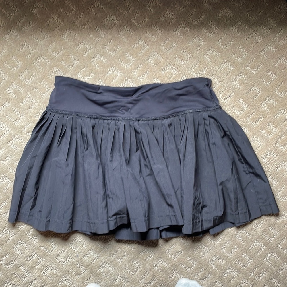 Black pleated lululemon skirt, size 2